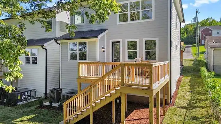 Phone on video mode hovering over backyard render with comment bubbles Phone on video mode hovering over backyard render with comment bubbles